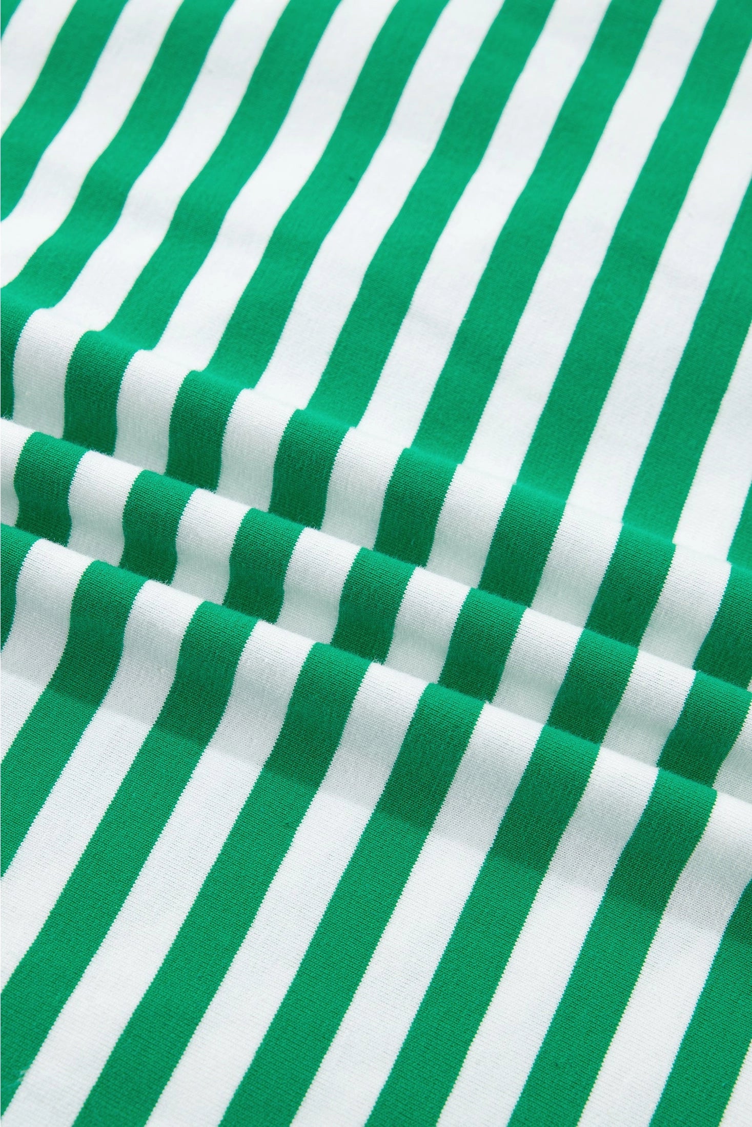 Crafted from a soft, high-stretch cotton blend.
Bold stripes make a statement, beautifully framed by contrast trim at the neckline and sleeves.
The self-tie waist detail lets you cinch and shape for a flattering fit that's uniquely yours.
Pair it with white sneakers for a casual weekend look or slip on sandals for a breezy, laid-back vibe that feels both put-together and relaxed.&nbsp;
Delicate wash, hang to dry.