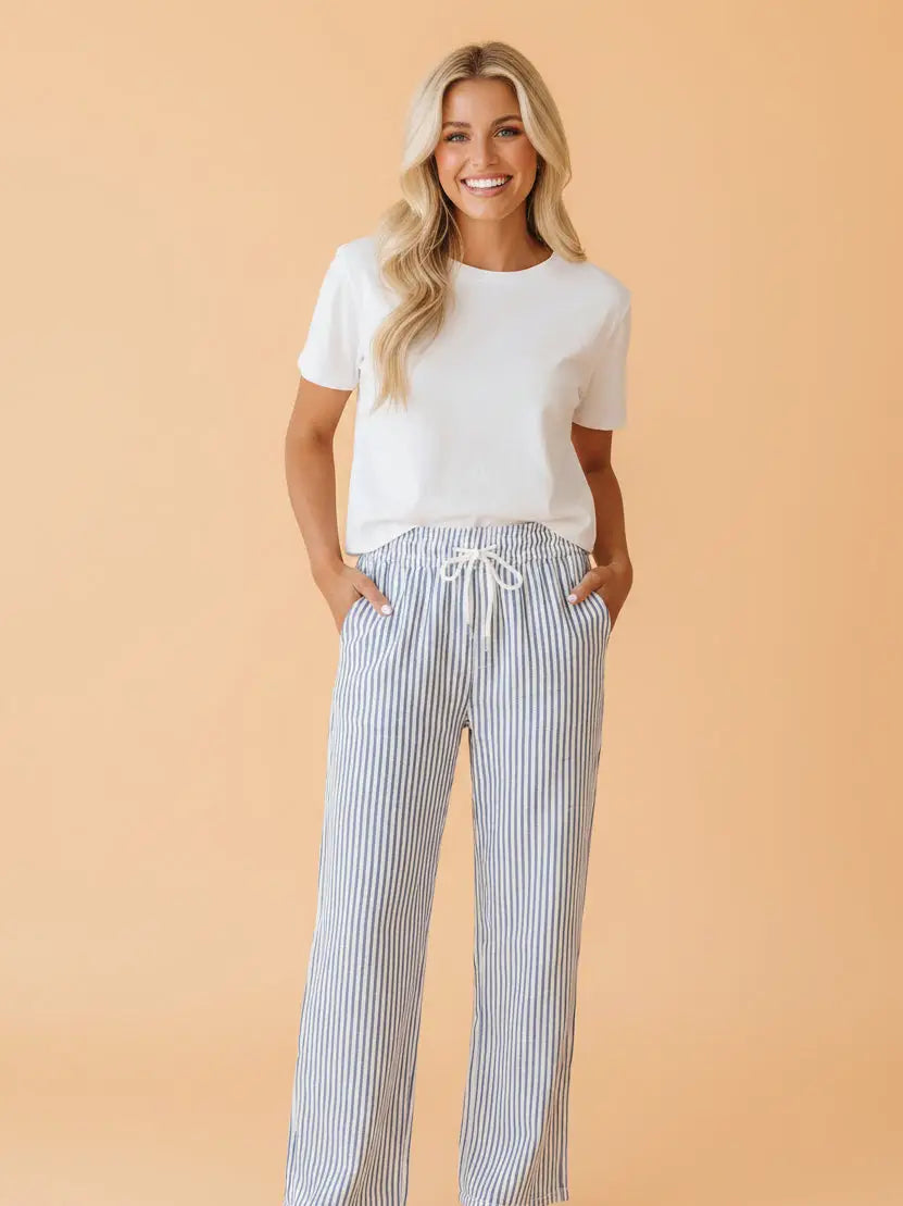 Classic striped wide leg pants.

Medium (Size 8-10) Inseam: 27.6", Front Rise: 13.4", Hip: 43.3"
Crafted from a soft, polyester cotton spandex blend.
Classic striped pattern brings timeless style to your wardrobe.
The functional drawstring waist lets you customize the fit for all-day comfort, while side seam pockets keep your essentials within reach.
Relaxed wide leg silhouette delivers breathable airflow and unrestricted movement, making these ankle length pants perfect for warm weather wear.&nbsp;
Delicat