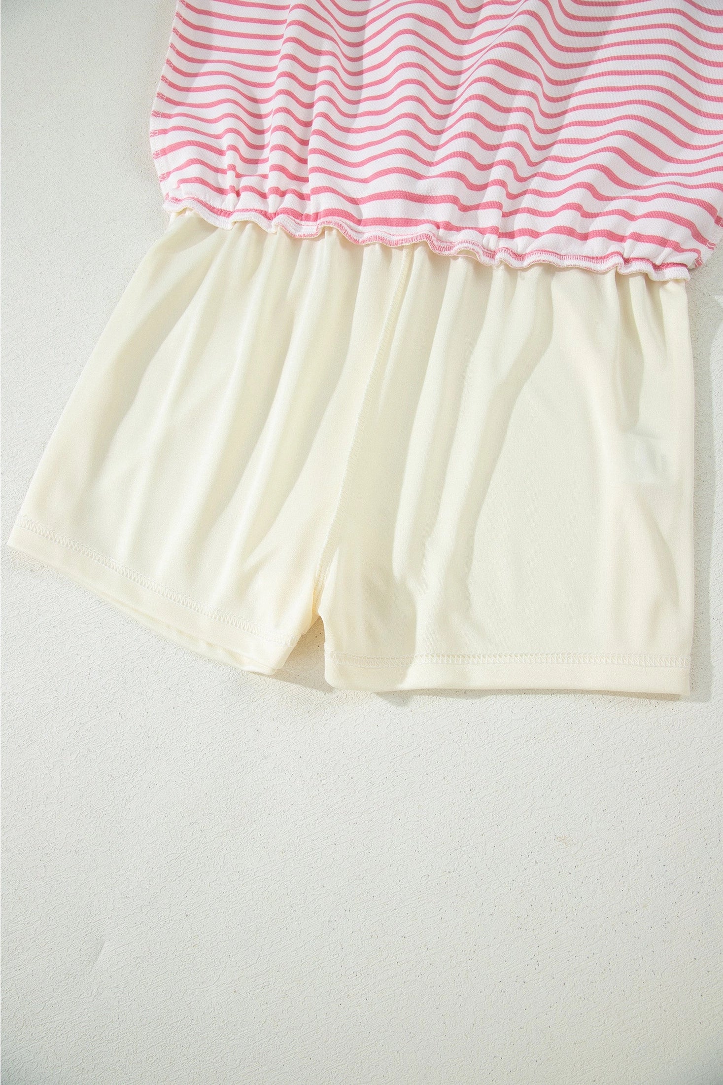 Pink polo striped skort set.

Medium (Size 8-10) Bust: 43", Skort Length: 15", Waist: 28.7"
Crafted from a soft, polyester cotton blend.
Charming two-piece set that effortlessly blends preppy style with everyday comfort.
Classic striped polo top features a crisp ribbed collar and short sleeves, perfectly paired with a drawstring elastic waist mini skort complete with built-in shorts for versatile wear.
Crafted from soft, breathable cotton-blend fabric, this set keeps you cool and comfortable through warm da