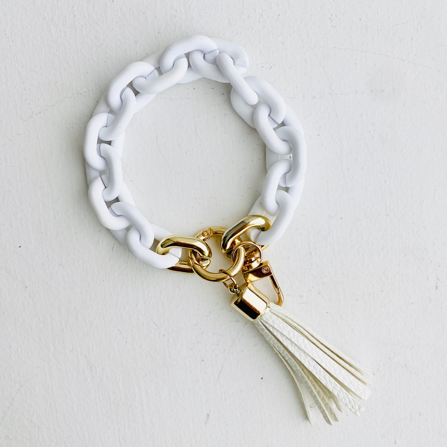 These adorable bangle keychains are perfect for the girl who's always got her hands full!

• Non-elastic

• Small-sized tassels

• Vibrant colors

• High quality resin&nbsp;