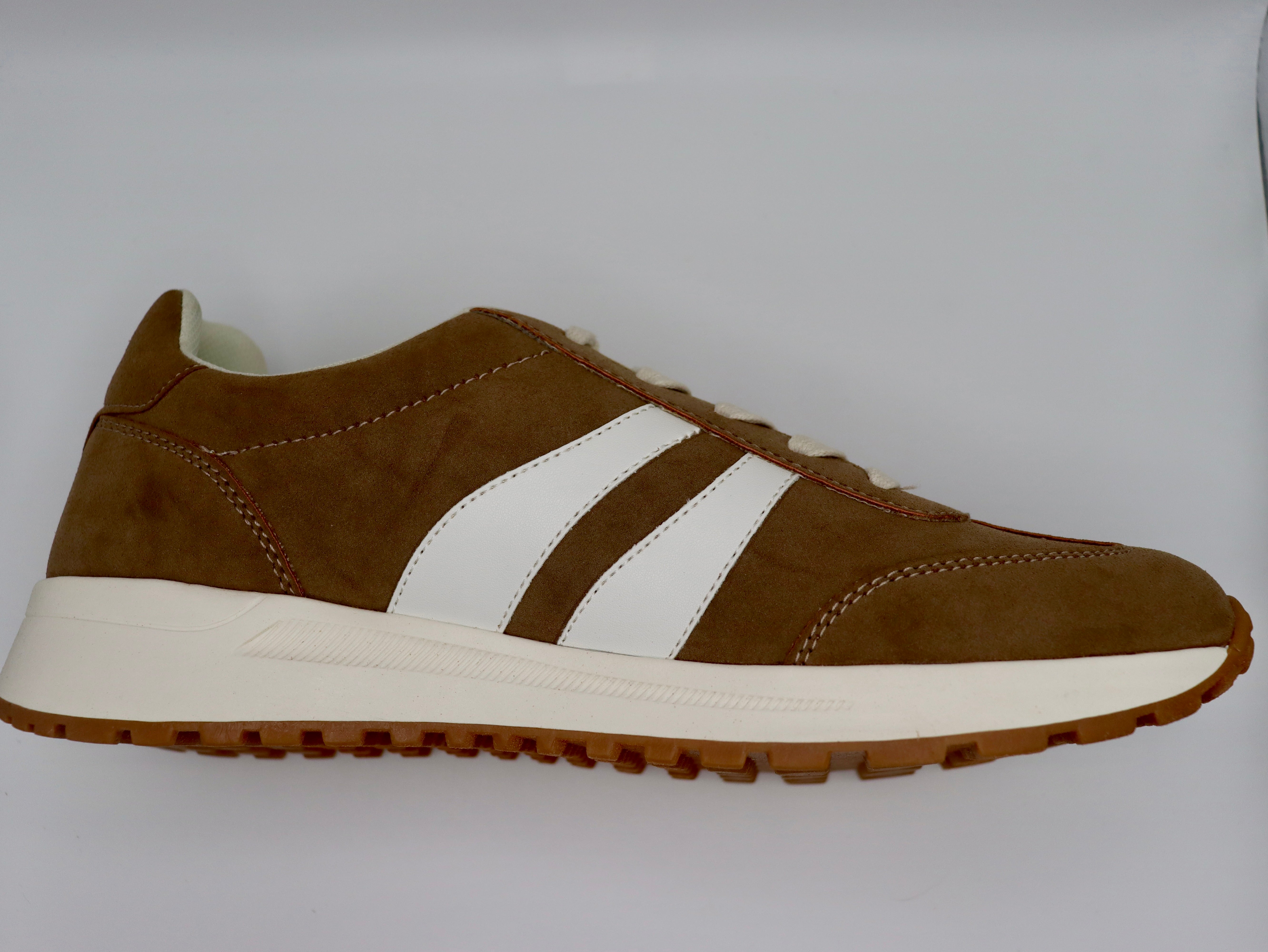 Comfy, stylish mocha sneakers by Jellypop.
New Balance
Memory foam insoles.
Made by Jellypop.