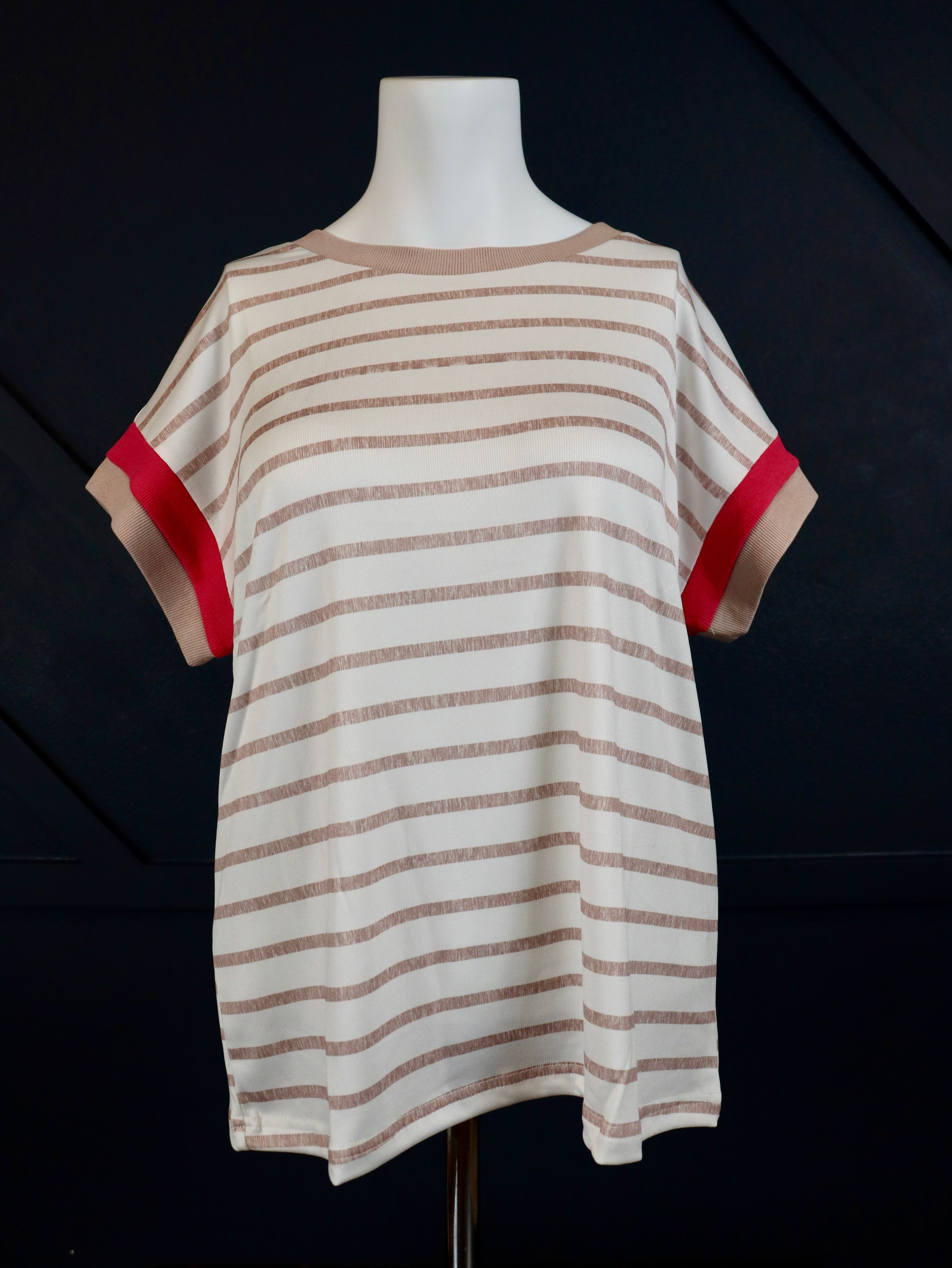 Striped Color Block T-Shirt.
Crafted from a soft polyester blend.
True to size.
Khaki striped with pink trim.
Delicate wash, hang to dry.