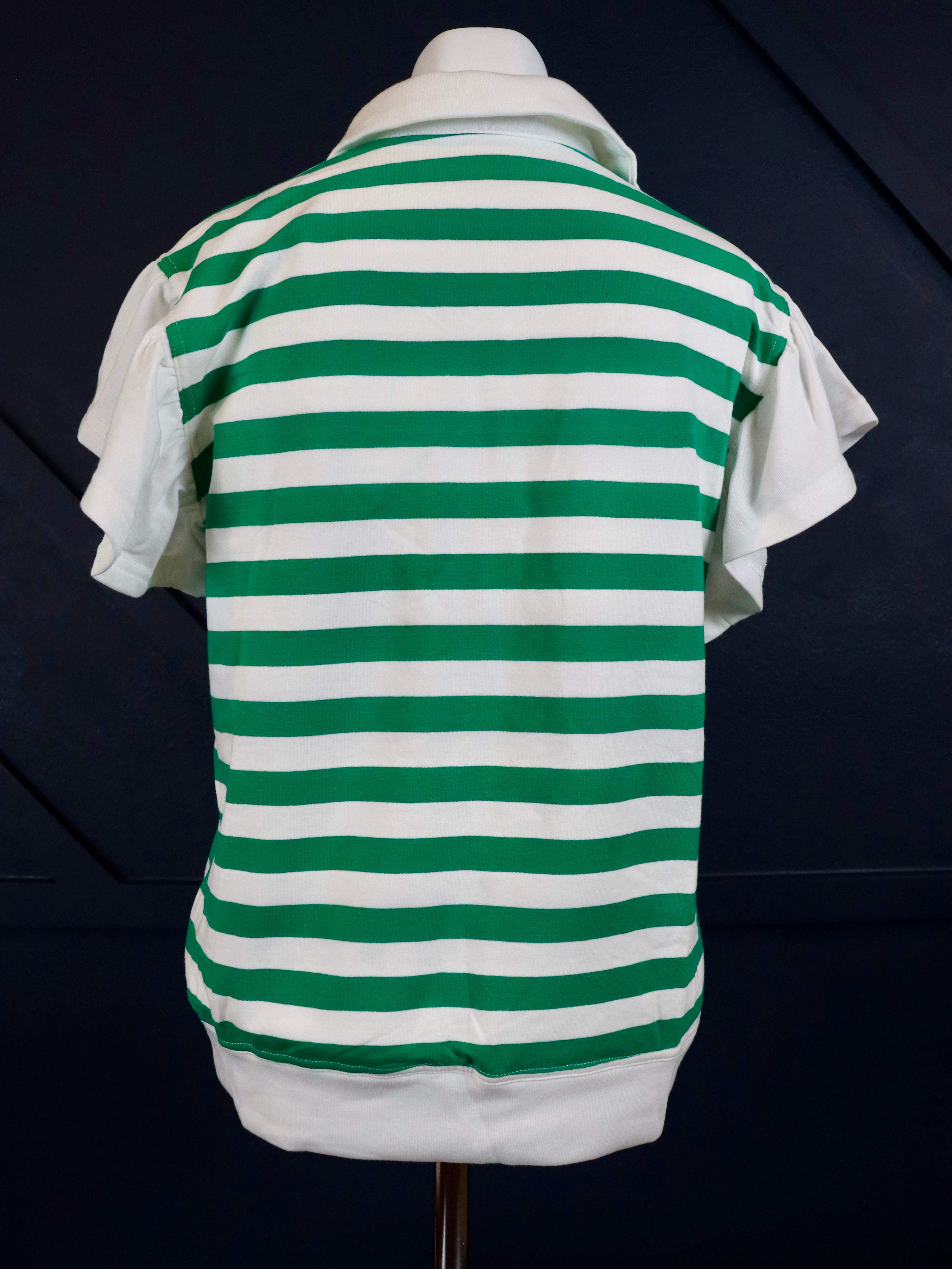 Short ruffle sleeve collared v-neck blouse.

Crafted from a soft breathable 95% cotton 5% elastane&nbsp;blend.
Relaxed fit.&nbsp;
Delicate wash, tumble dry low.