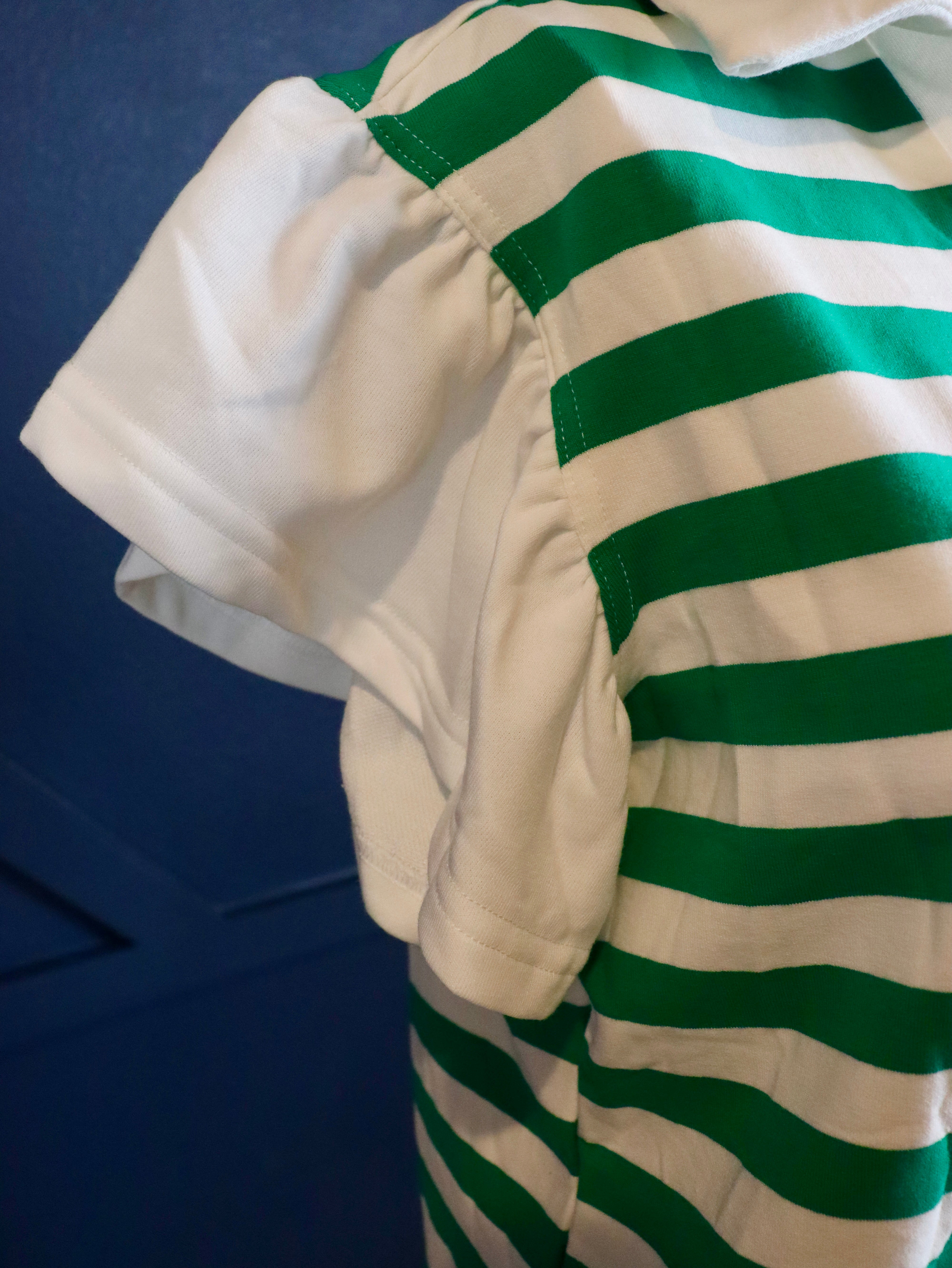 Short ruffle sleeve collared v-neck blouse.

Crafted from a soft breathable 95% cotton 5% elastane&nbsp;blend.
Relaxed fit.&nbsp;
Delicate wash, tumble dry low.