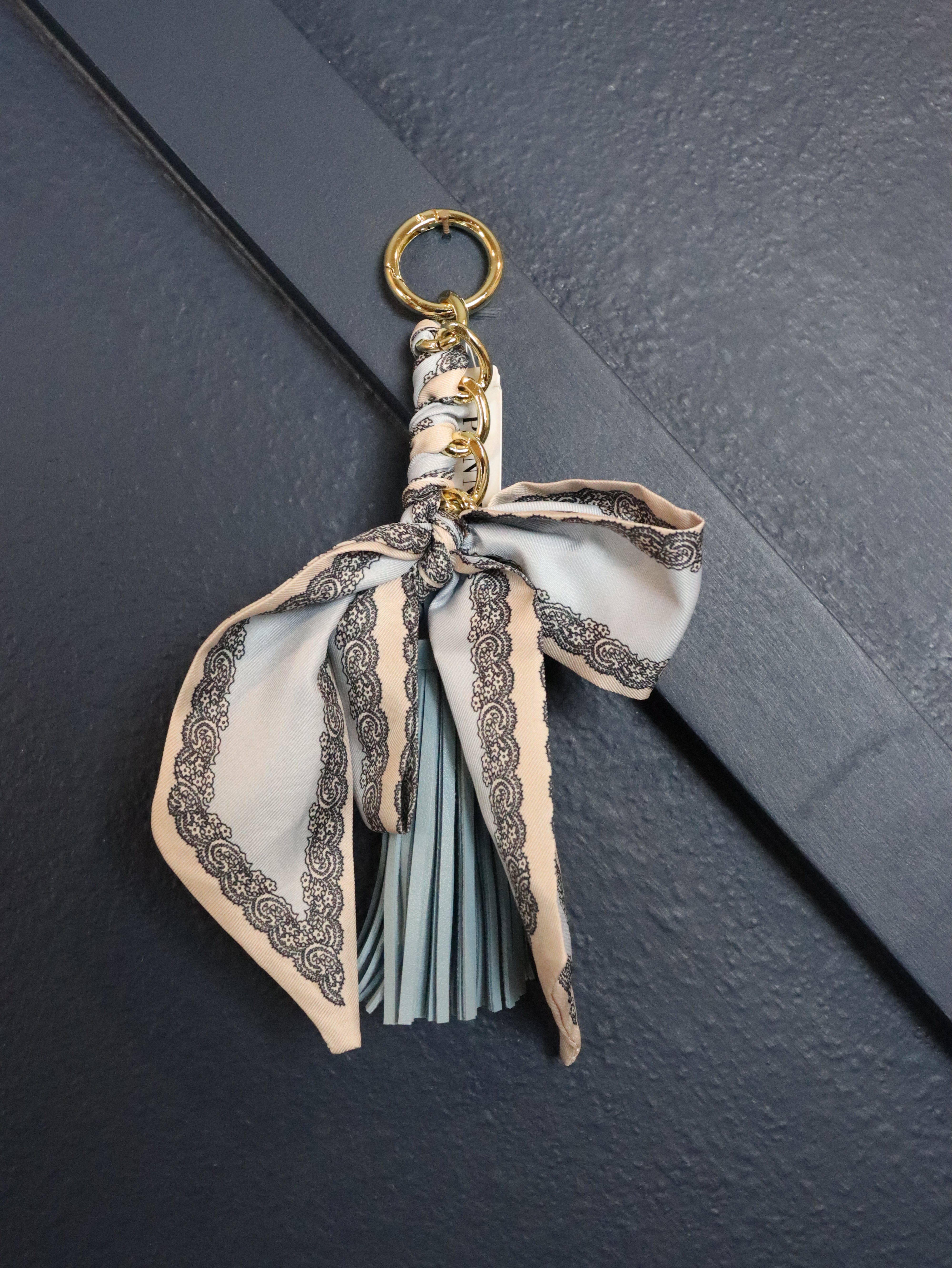 Bag charm with tassel