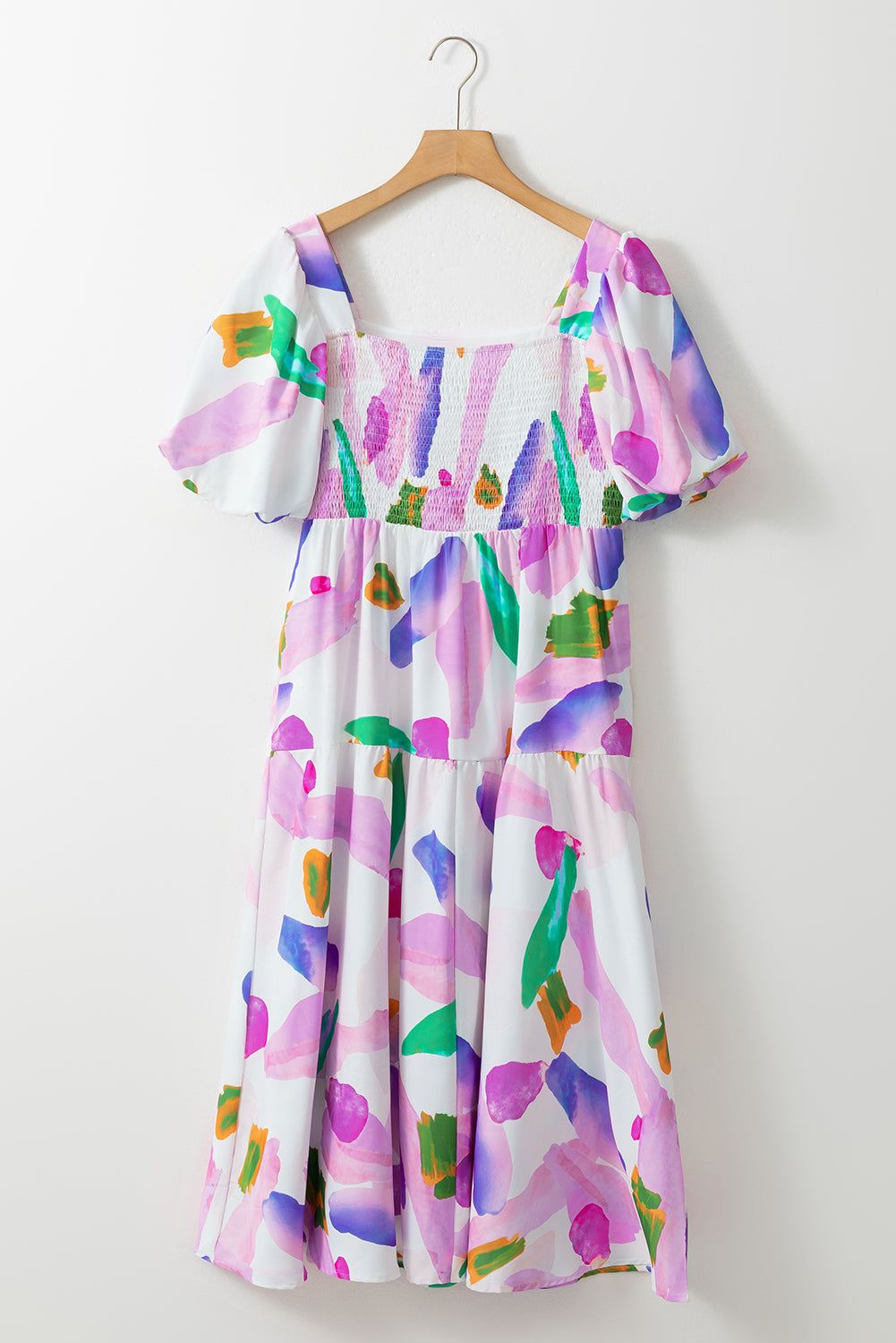 Purple abstract print puff sleeve smocked back dress.

Size 8
Bust: 34", Length: &nbsp;39", Sleeve Length: &nbsp;12"
100% Polyester
Delicate wash, hang to dry.