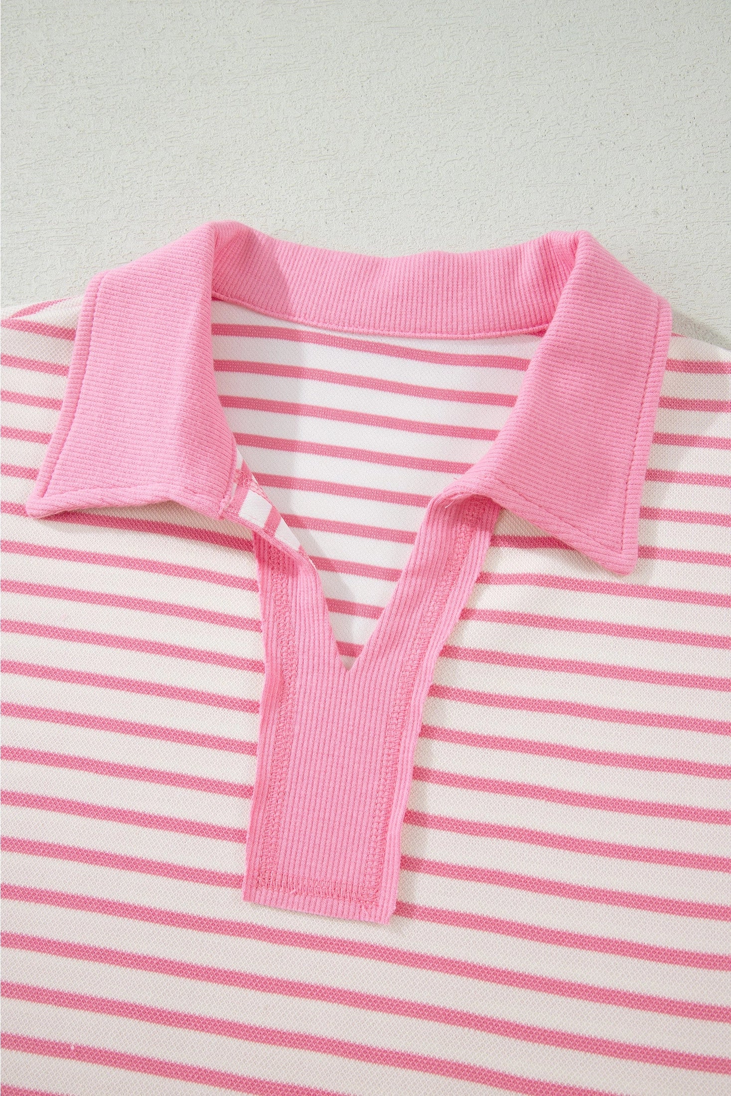 Pink polo striped skort set.

Medium (Size 8-10) Bust: 43", Skort Length: 15", Waist: 28.7"
Crafted from a soft, polyester cotton blend.
Charming two-piece set that effortlessly blends preppy style with everyday comfort.
Classic striped polo top features a crisp ribbed collar and short sleeves, perfectly paired with a drawstring elastic waist mini skort complete with built-in shorts for versatile wear.
Crafted from soft, breathable cotton-blend fabric, this set keeps you cool and comfortable through warm da