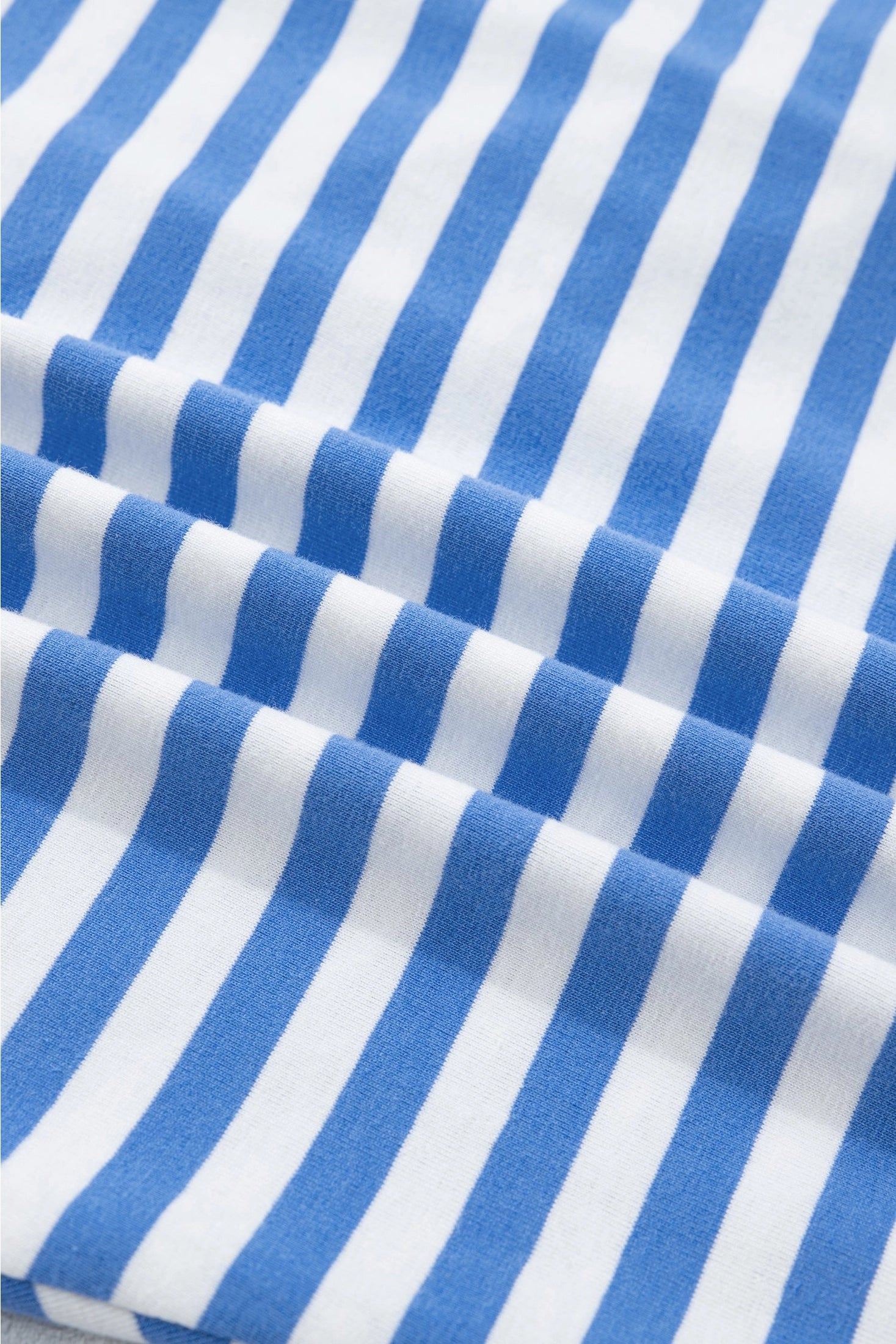 Crafted from a soft, high-stretch cotton blend.
Bold stripes make a statement, beautifully framed by contrast trim at the neckline and sleeves.
The self-tie waist detail lets you cinch and shape for a flattering fit that's uniquely yours.
Pair it with white sneakers for a casual weekend look or slip on sandals for a breezy, laid-back vibe that feels both put-together and relaxed.&nbsp;
Delicate wash, hang to dry.