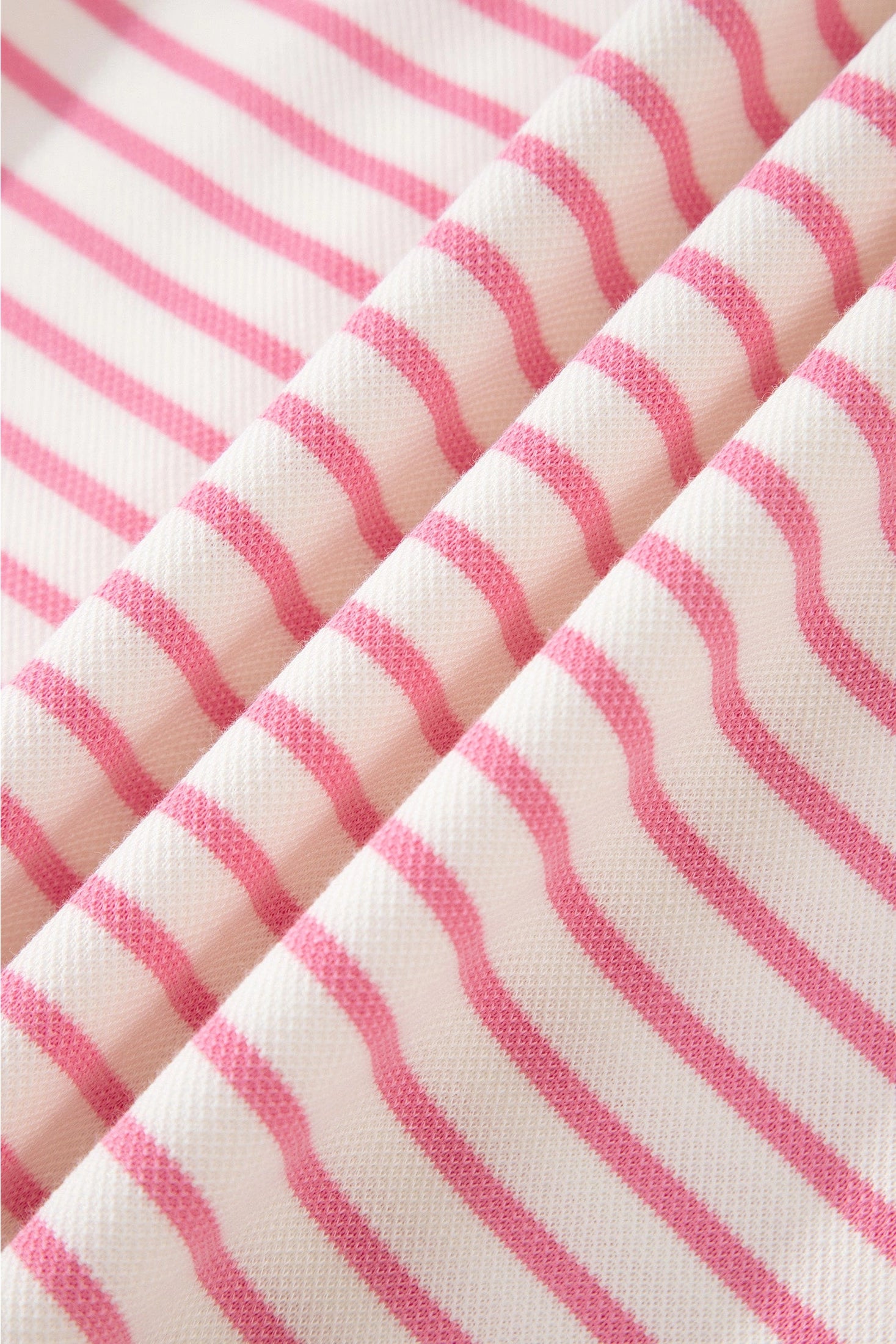 Pink polo striped skort set.

Medium (Size 8-10) Bust: 43", Skort Length: 15", Waist: 28.7"
Crafted from a soft, polyester cotton blend.
Charming two-piece set that effortlessly blends preppy style with everyday comfort.
Classic striped polo top features a crisp ribbed collar and short sleeves, perfectly paired with a drawstring elastic waist mini skort complete with built-in shorts for versatile wear.
Crafted from soft, breathable cotton-blend fabric, this set keeps you cool and comfortable through warm da