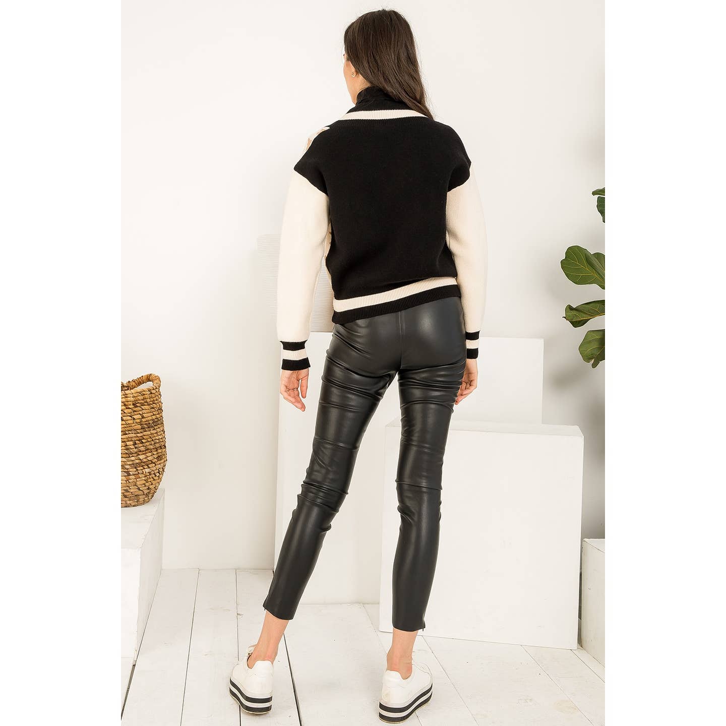 Block leopard print knit cardigan by THML.&nbsp;

Fun Varsity/Letterman style cardigan.
Roomy.
55% Viscose, 28% Polyester, 17% Nylon
Cool delicate wash, lay flat to dry, NO dryer.
Made by THML