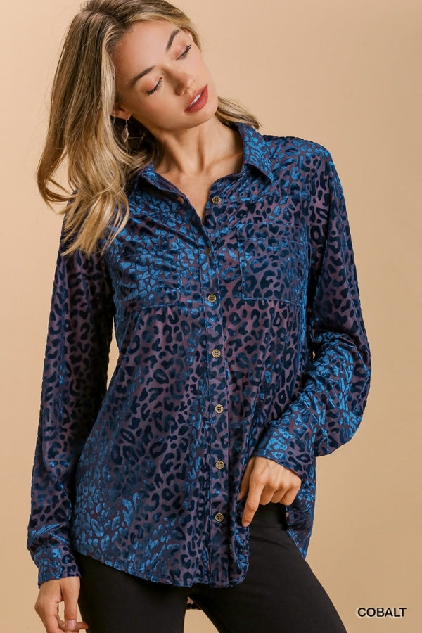 Soft, unique, button down.  True to size with slight stretch. 59% Polyester, 30% Nylon, 11% Spandex Made by Umgee