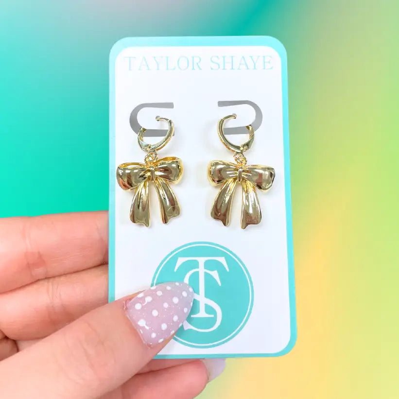 Kylie Bow drop earrings.

Made by Taylor Shaye.