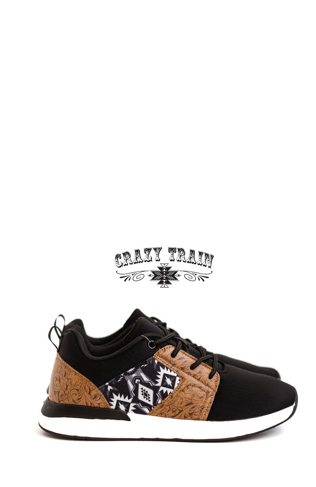 Black with aztec and tooled leather print.  Tooled leather print (not actual leather). Made by CRAZY TRAIN