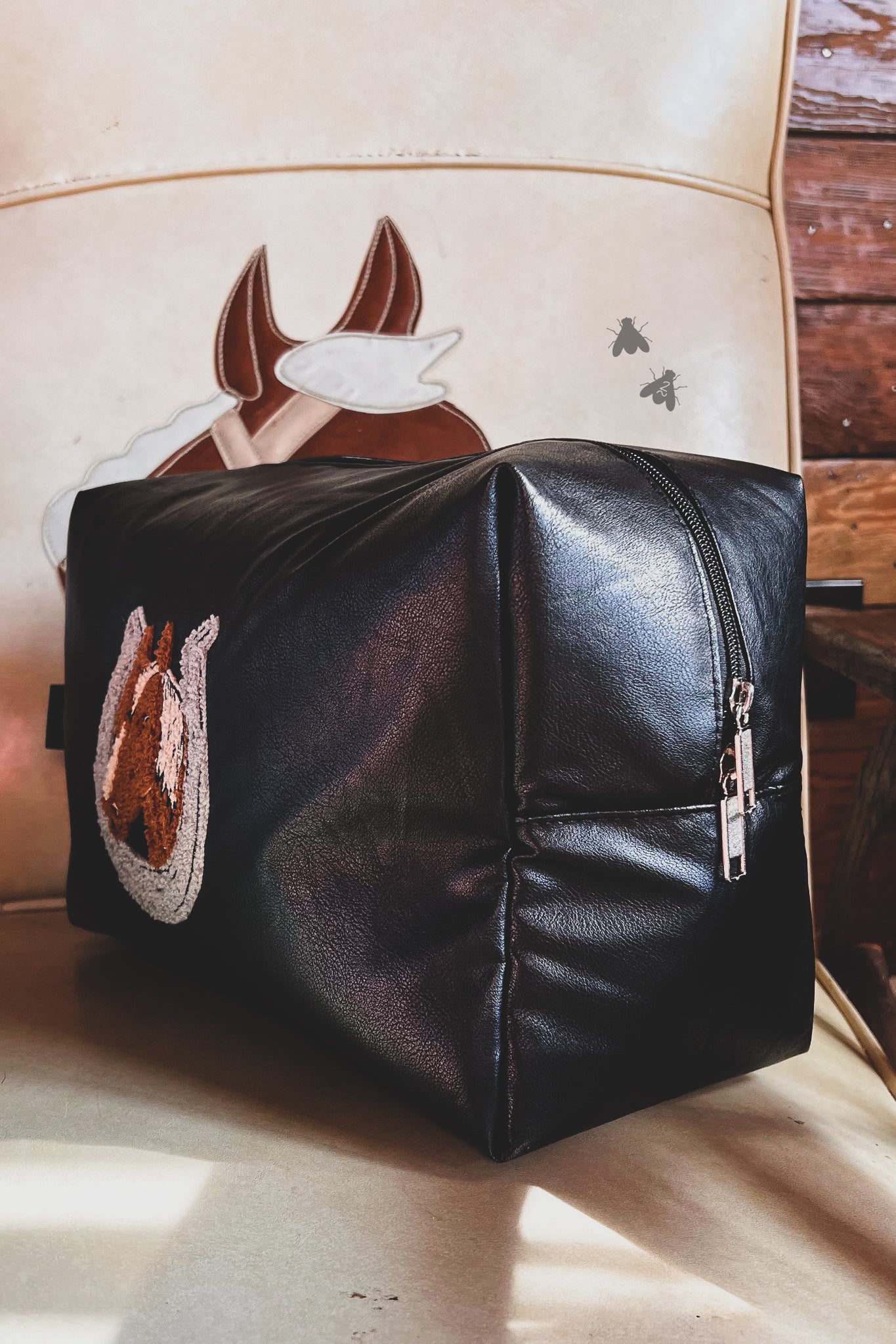 Lucky Horse travel bag.  Check out the measurements on this bag!   And don't forget the matching pouch:)  13" x 6" x 9" Black with chenille horse head patch Easy to clean Made by 2 FLY