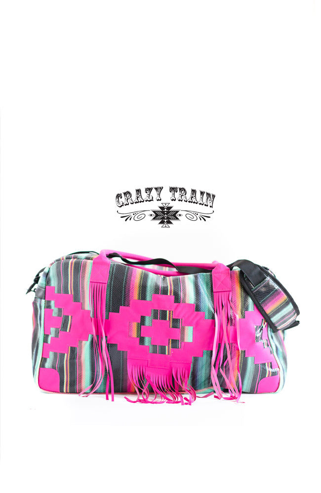 HUGE hot pink serape bag with FRINGE:)  Measurements: 28"L x 10"W x 12"D Adjustable strap  100% Polyester Fully lined, but no inner pockets